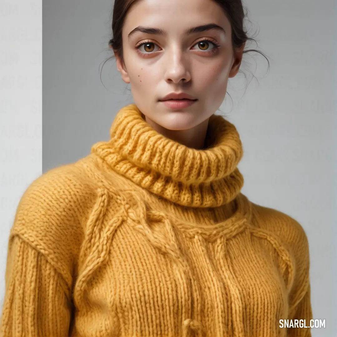 Pink sweater hanging on a black background