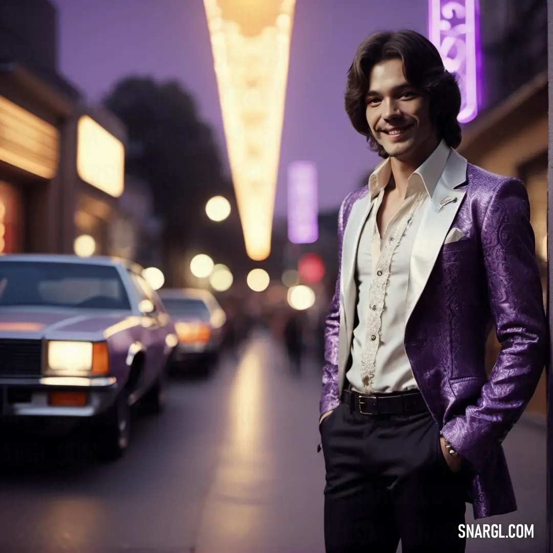 Man in a purple suit standing on a street corner next to a car and a building with a neon sign