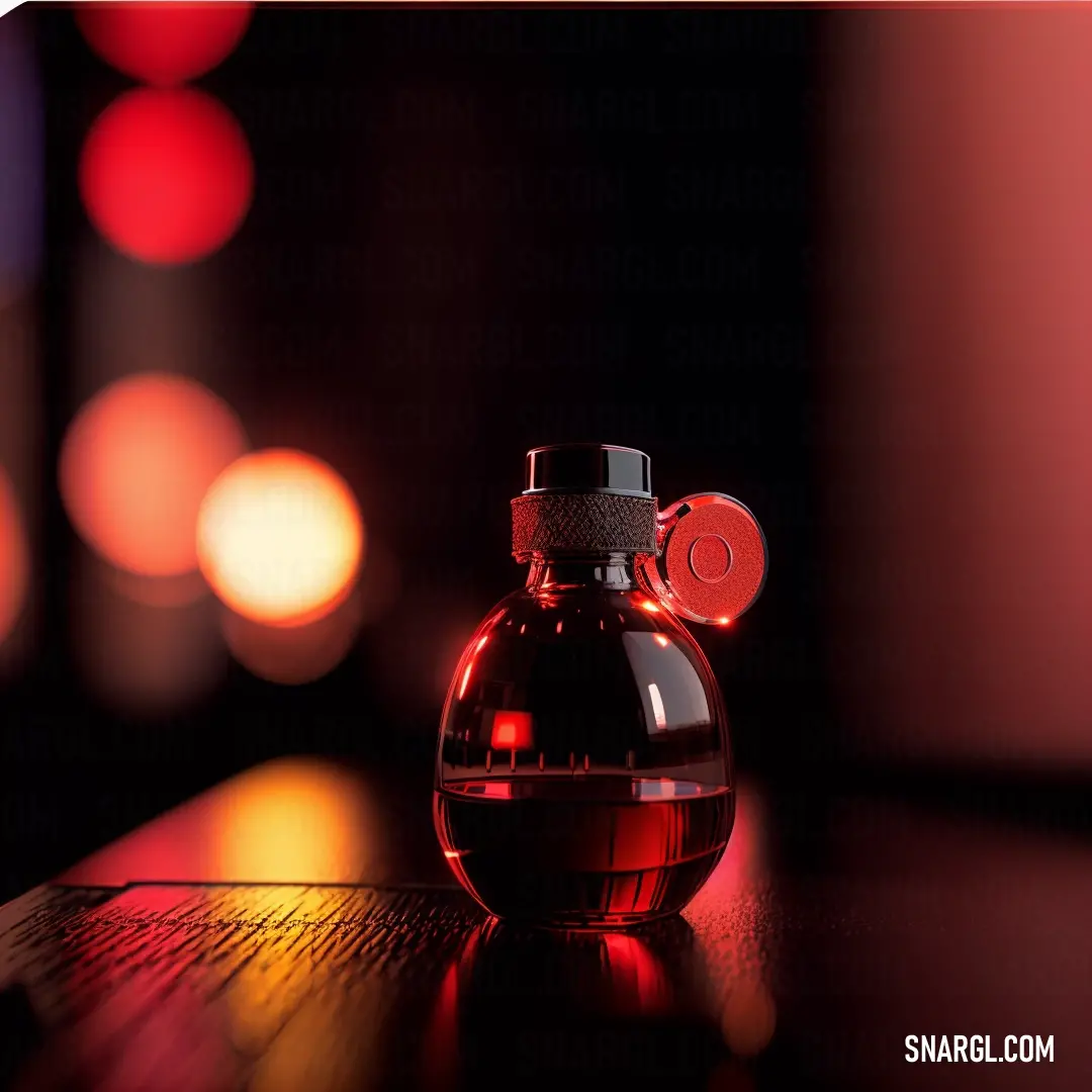 Small glass bottle with a red top on a table with a blurry background of lights