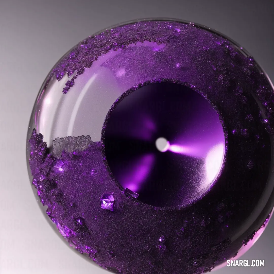 Purple object with a white background and a white background with a purple circle in the center of it