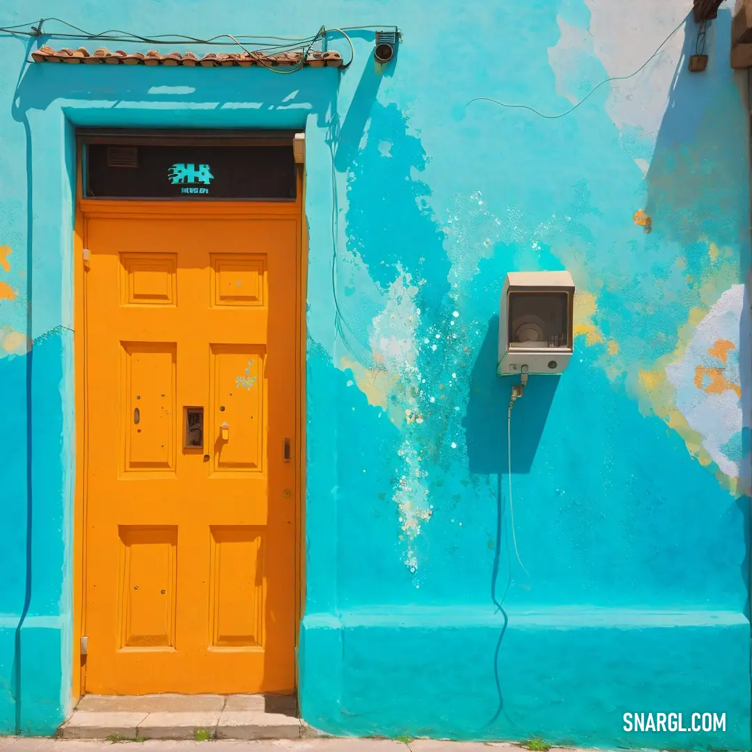 Yellow door and a blue wall with a phone on it and a phone on the wall