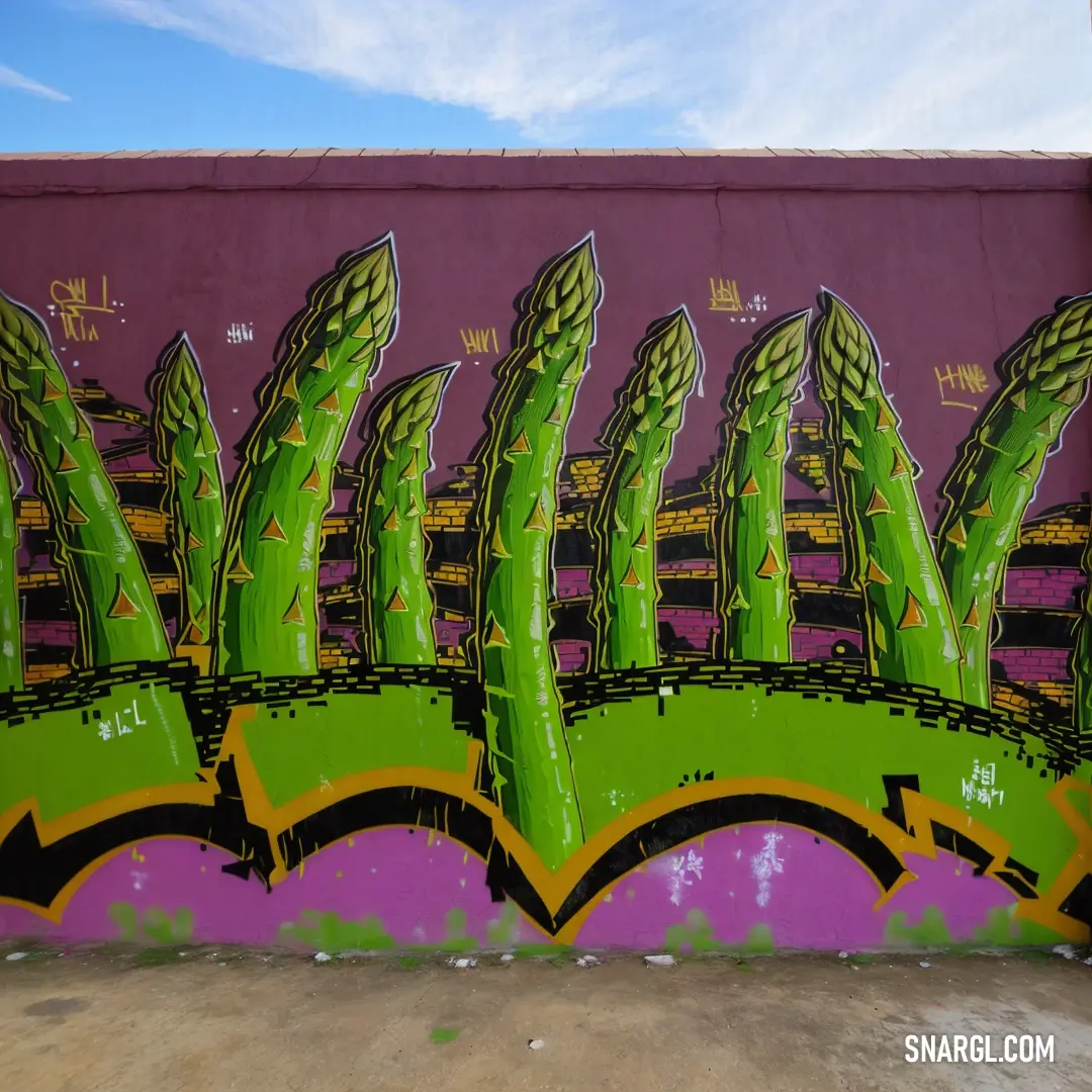 Wall with a bunch of green plants on it and a purple wall behind it with a sky background