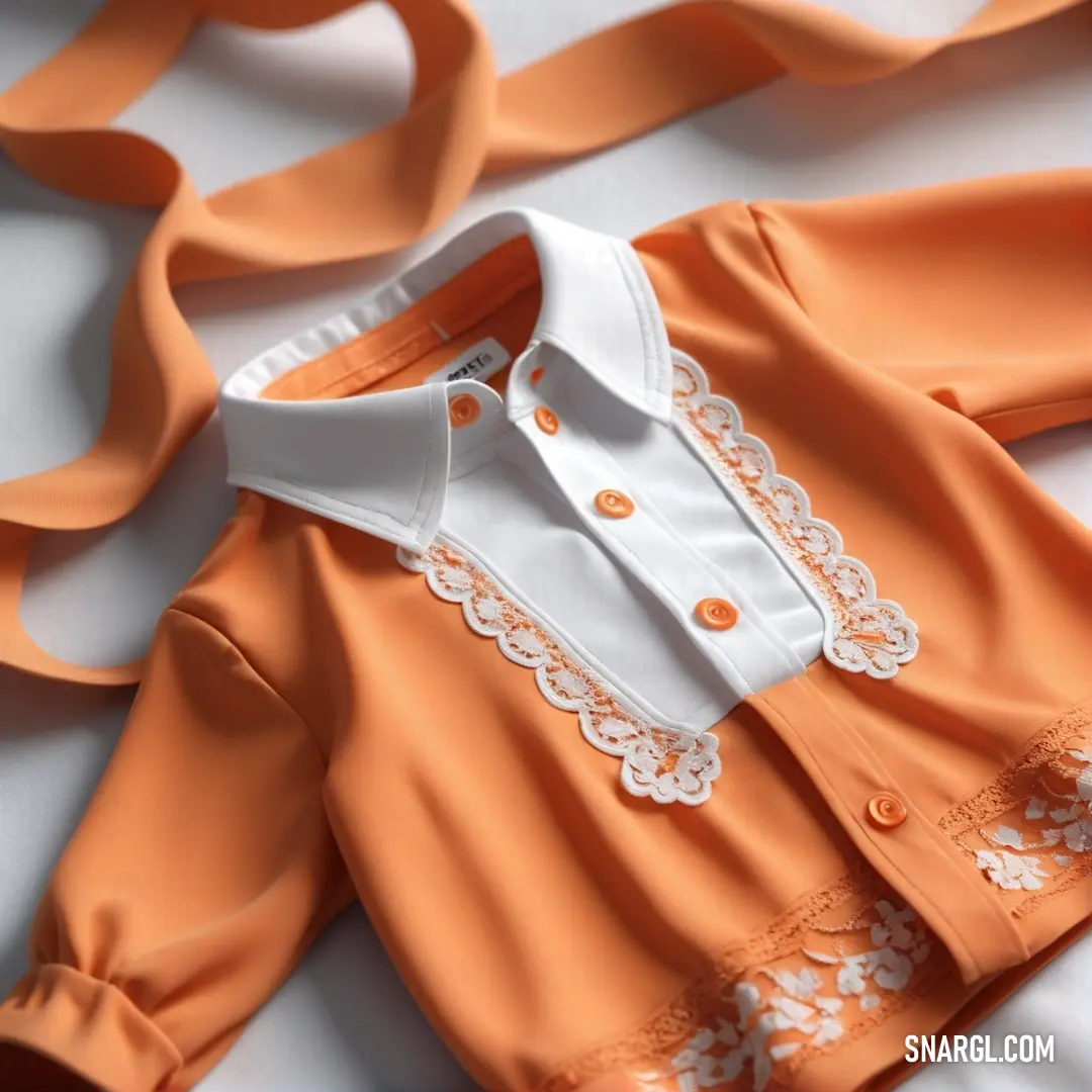 Baby's orange and white shirt and a ribbon on a bed sheet with a white shirt and orange. Color Atomic tangerine.