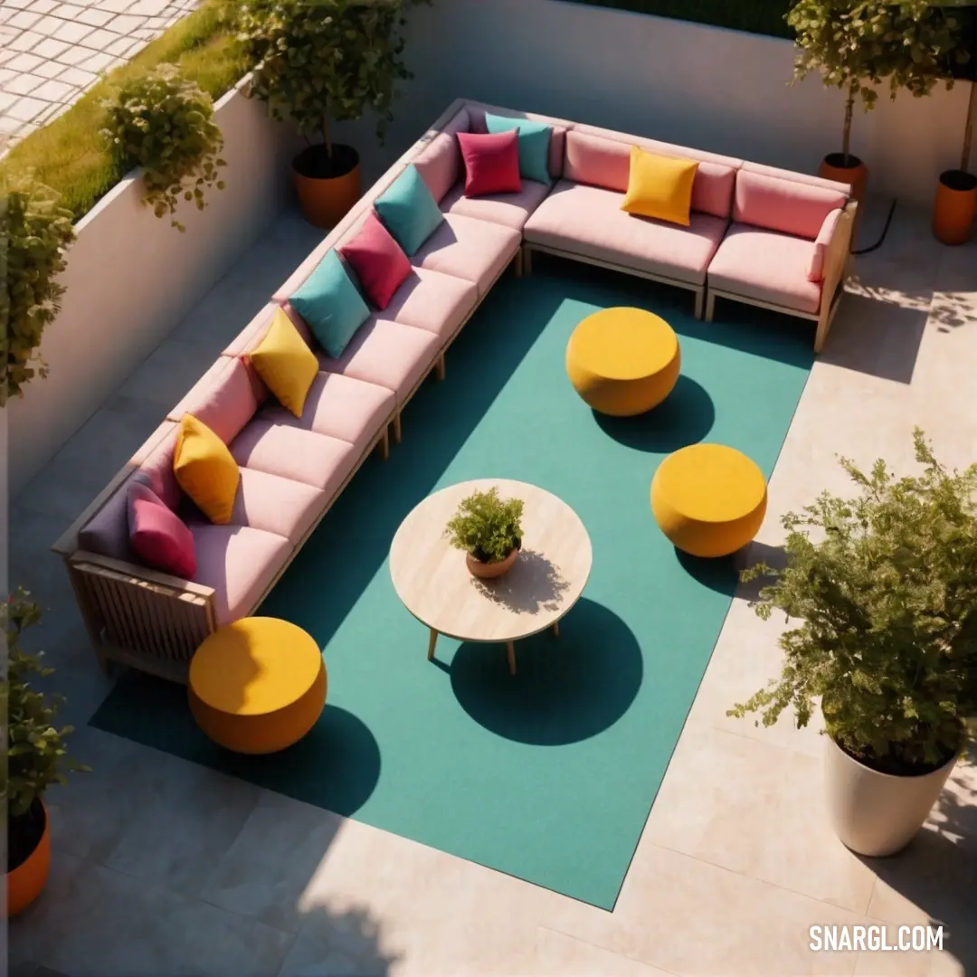 Couch and table in a small courtyard area with potted plants and a rug on the floor. Color RGB 255,225,53.