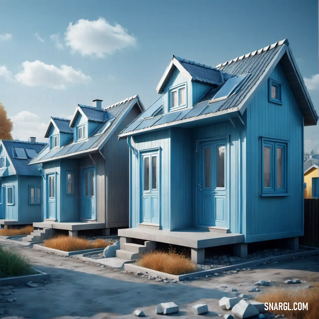 Row of blue houses with a sky background. Color Beau blue.