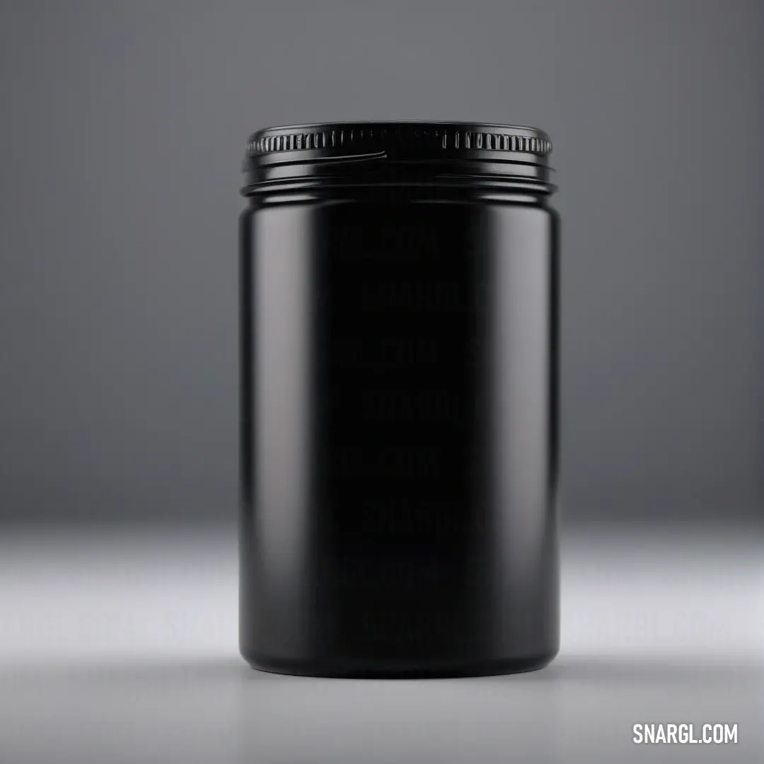 Black color example: Black jar with a lid on a table with a gray background