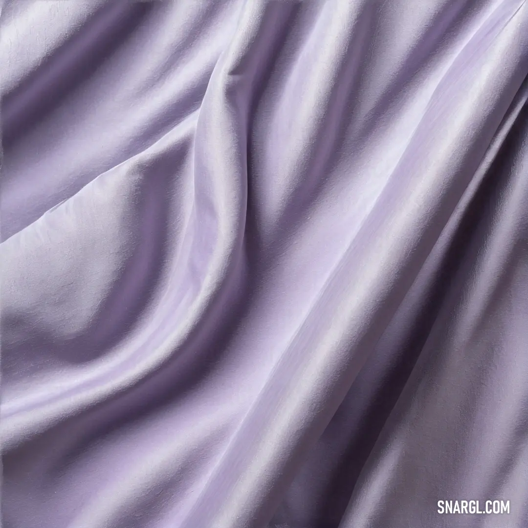 Close up of a purple fabric with a white background and a black border on the bottom of the image. Color RGB 162,162,208.