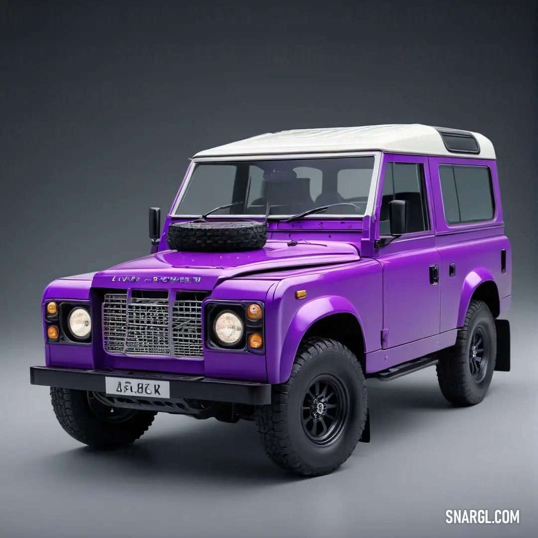 Blue violet color example: Purple and white land rover is shown in this picture, it is a dark background