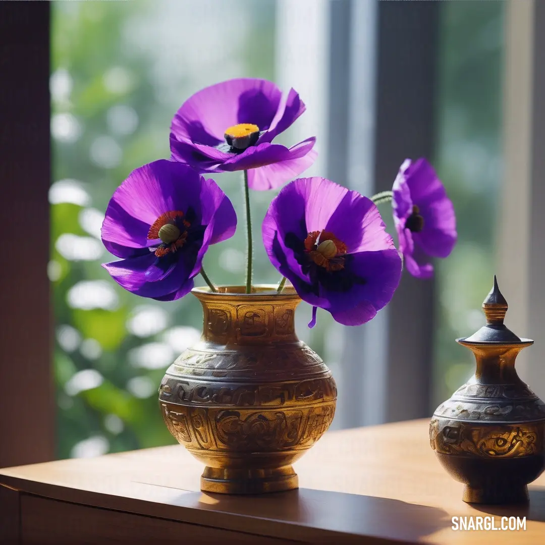 Vase with purple flowers in it on a table next to a window sill. Example of CMYK 39,81,0,11 color.