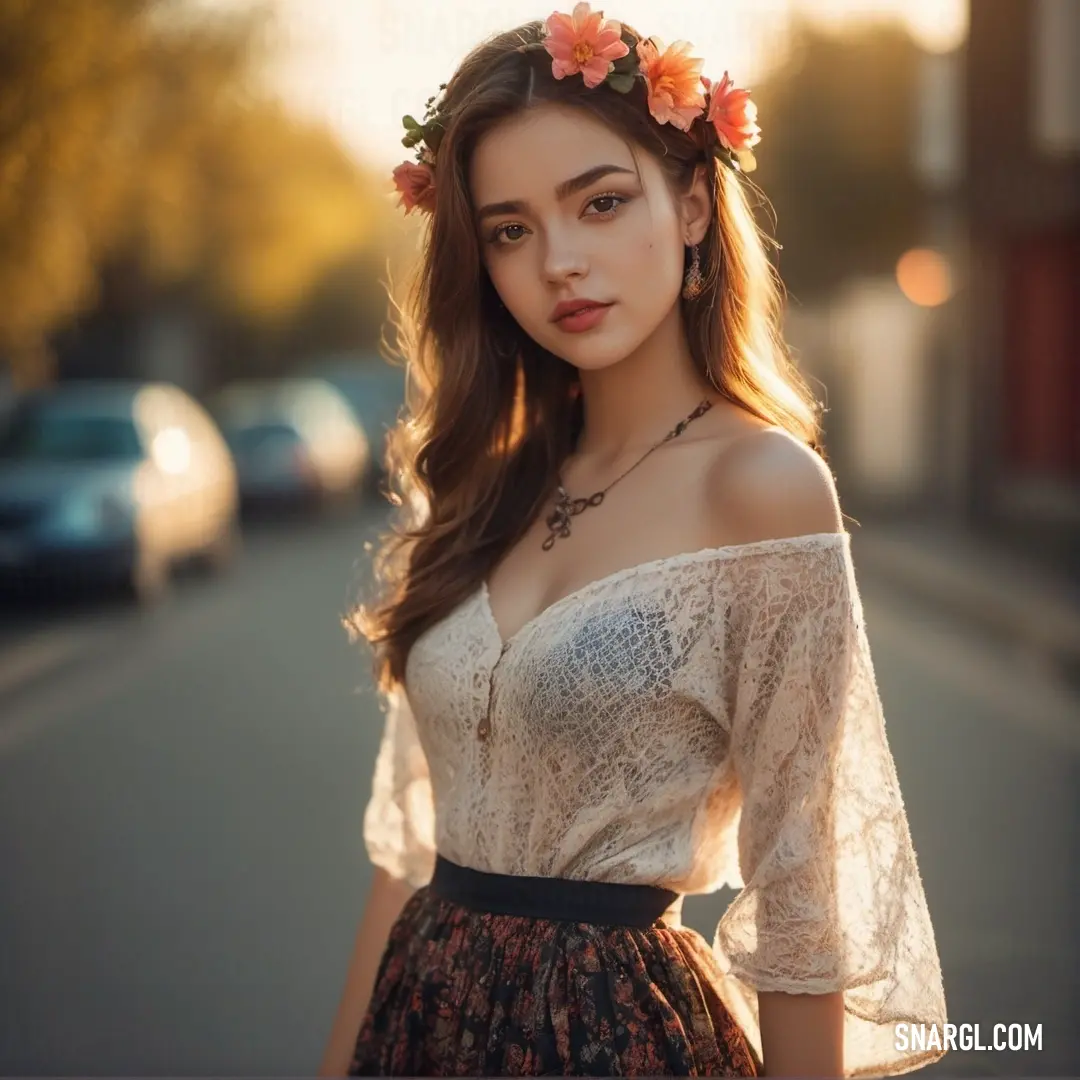 Woman with a flower crown on her head standing on a street corner in a dress and a blouse