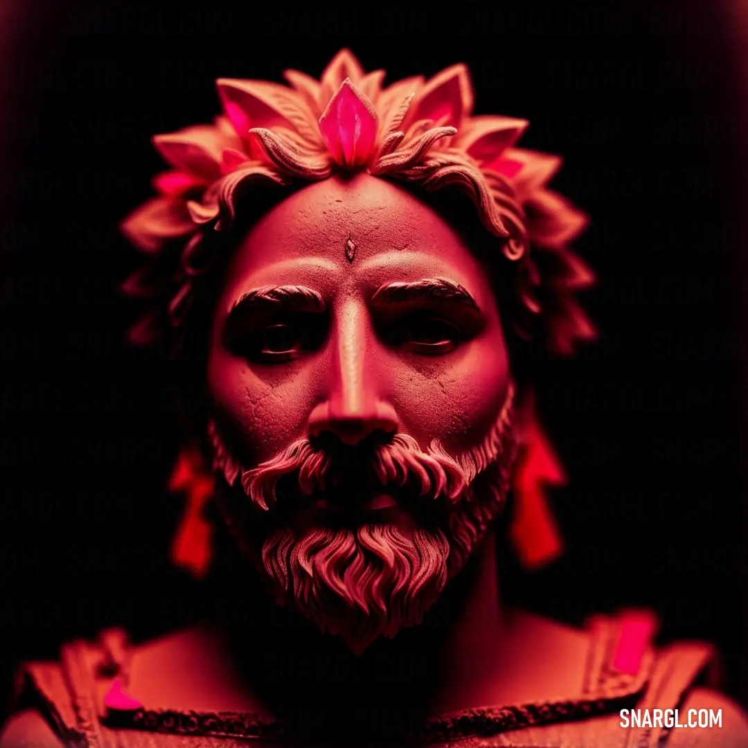 Statue of a man with a flower in his hair and beard wearing a red headdress