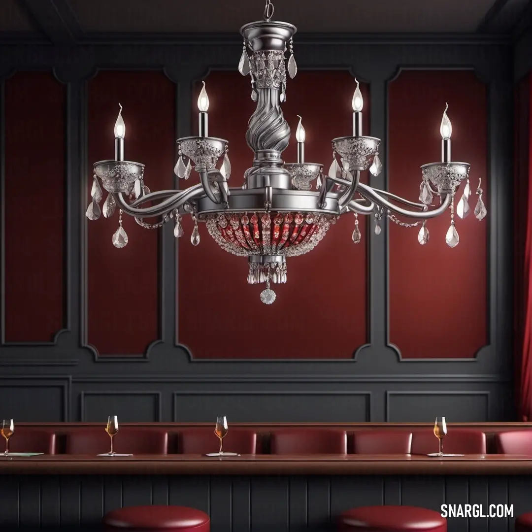 Brown color. Chandelier hanging from a ceiling in a restaurant with red walls and red stools