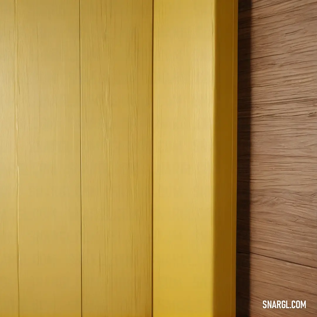 Yellow cabinet with a clock on it's side next to a wall. Color Buff.