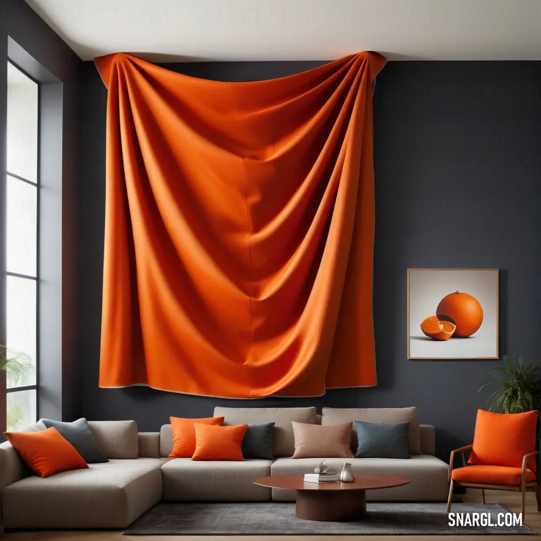 Living room with a large orange drape hanging over the couches and a coffee table with a vase on it. Color #CC5500.