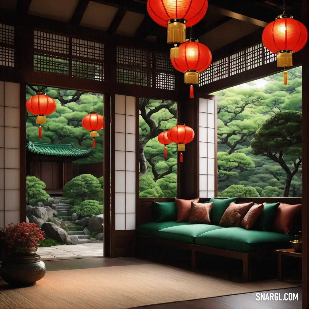 Cadmium red color. Room with a couch and oriental lanterns hanging from the ceiling and a painting on the wall behind it
