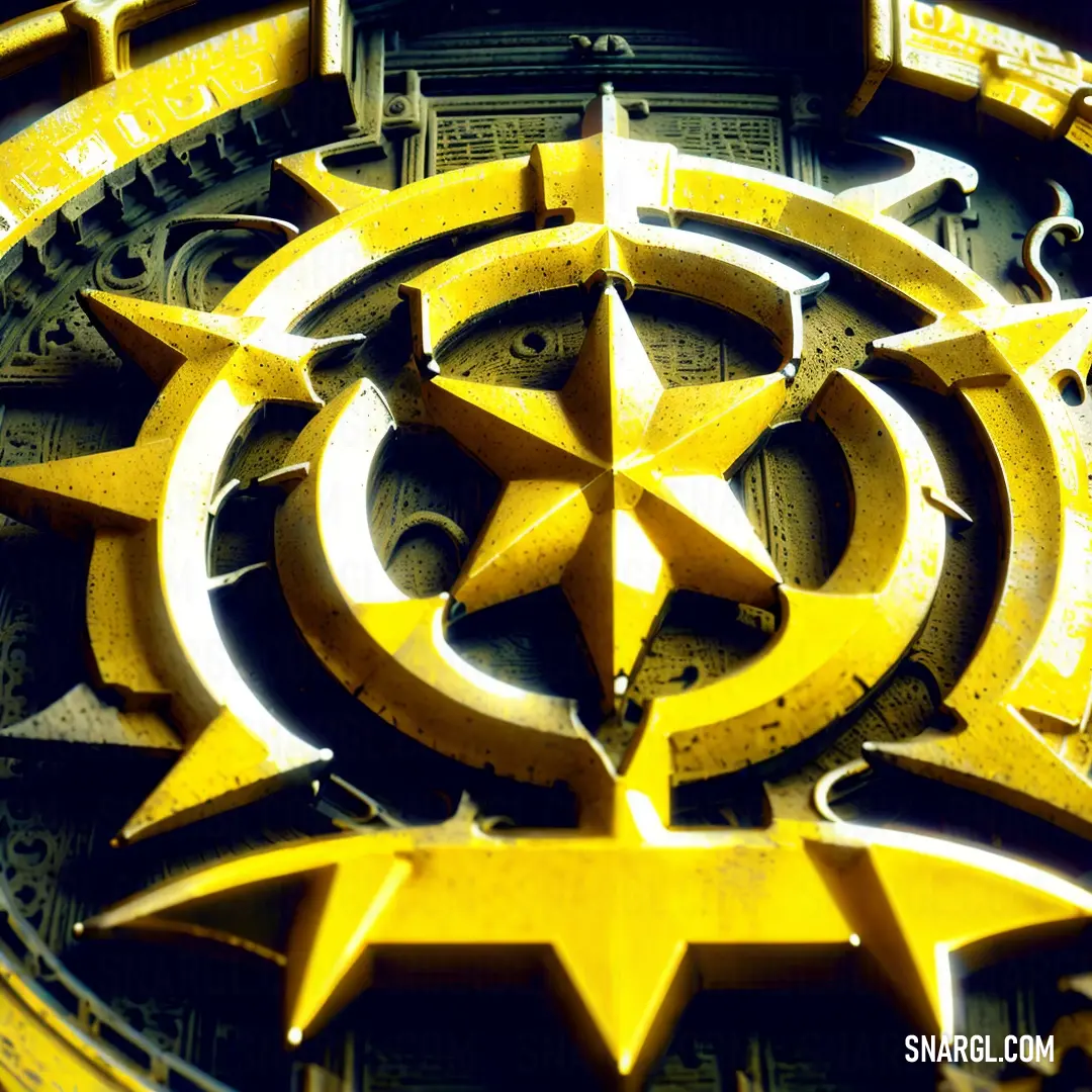 Close up of a yellow and black clock face with a star and a circle of stars on it
