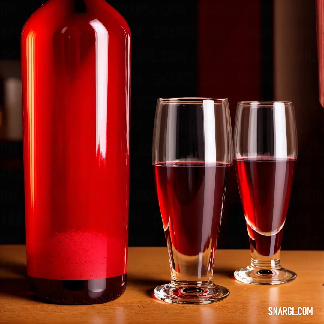 Bottle of wine and two glasses of wine on a table with a red background