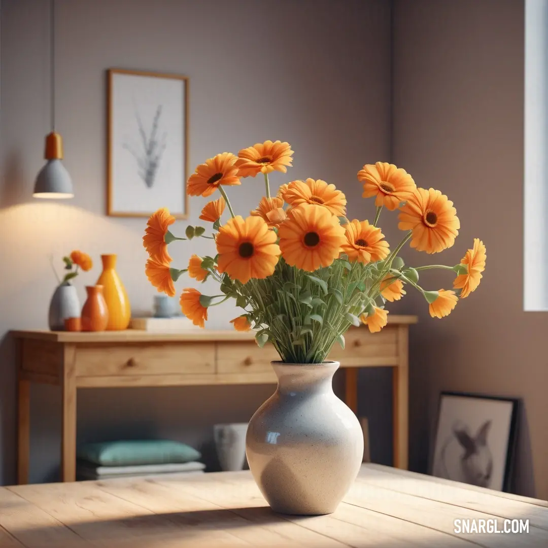 Vase of orange flowers on a table in a room with a table lamp and pictures on the wall. Color Carrot orange.