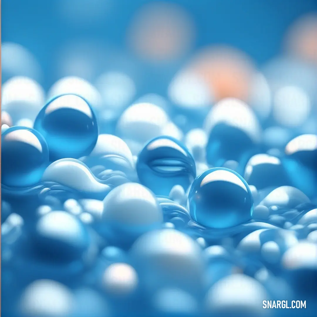 Bunch of blue and white balls in a blue bowl of water with a blurry background. Example of Celestial blue color.