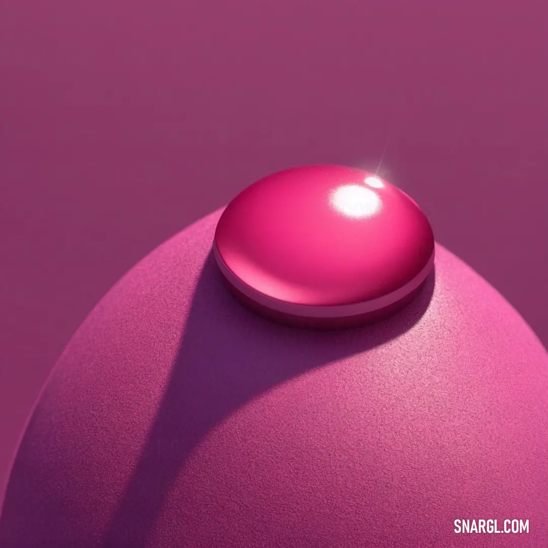 Pink object with a light shining on it's surface