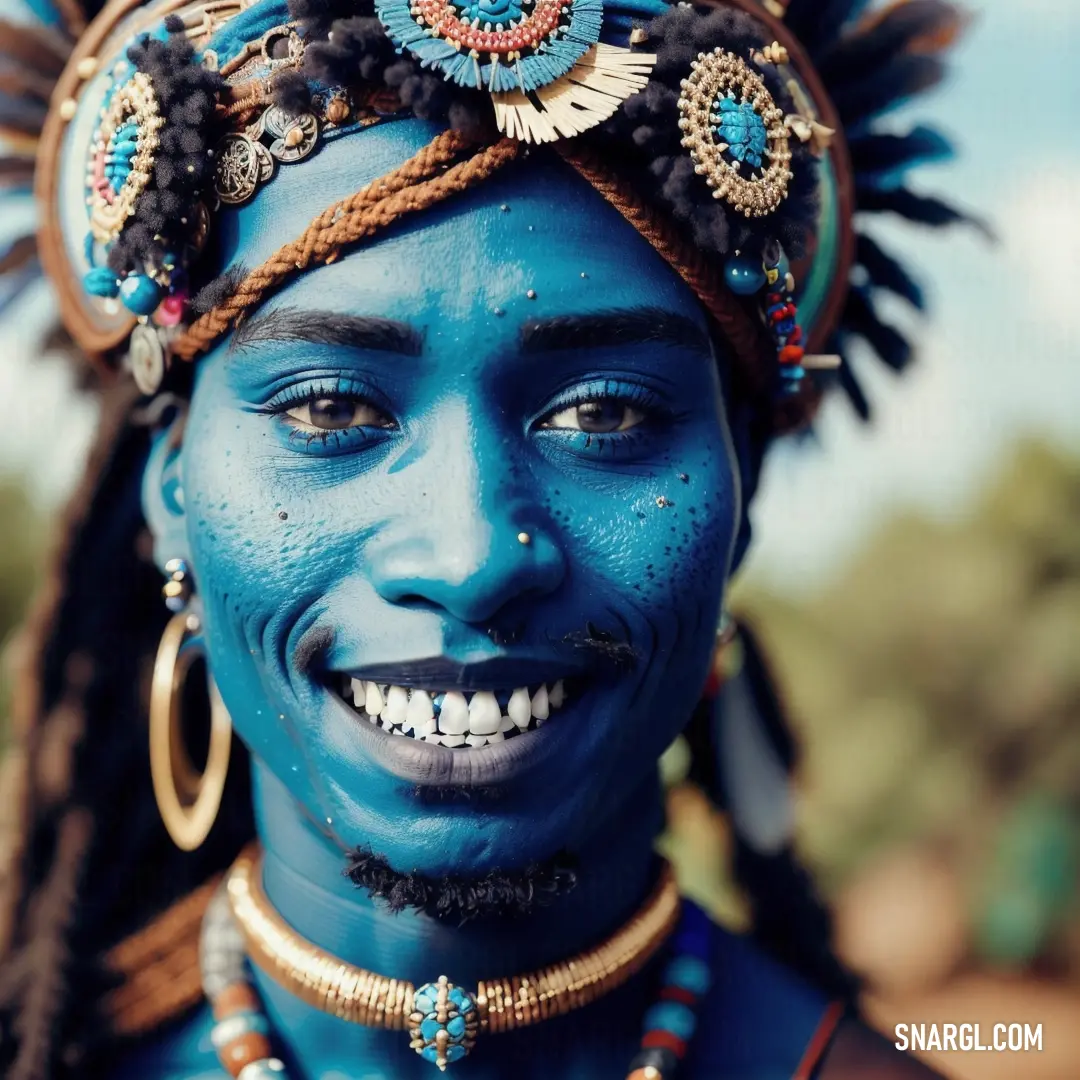 Woman with blue face paint and a headdress on her head