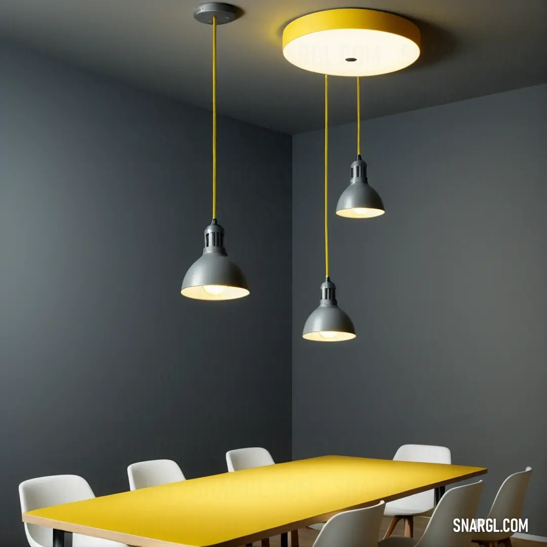 Charcoal color. Yellow table with white chairs and three lights hanging from it's ceiling in a room with gray walls
