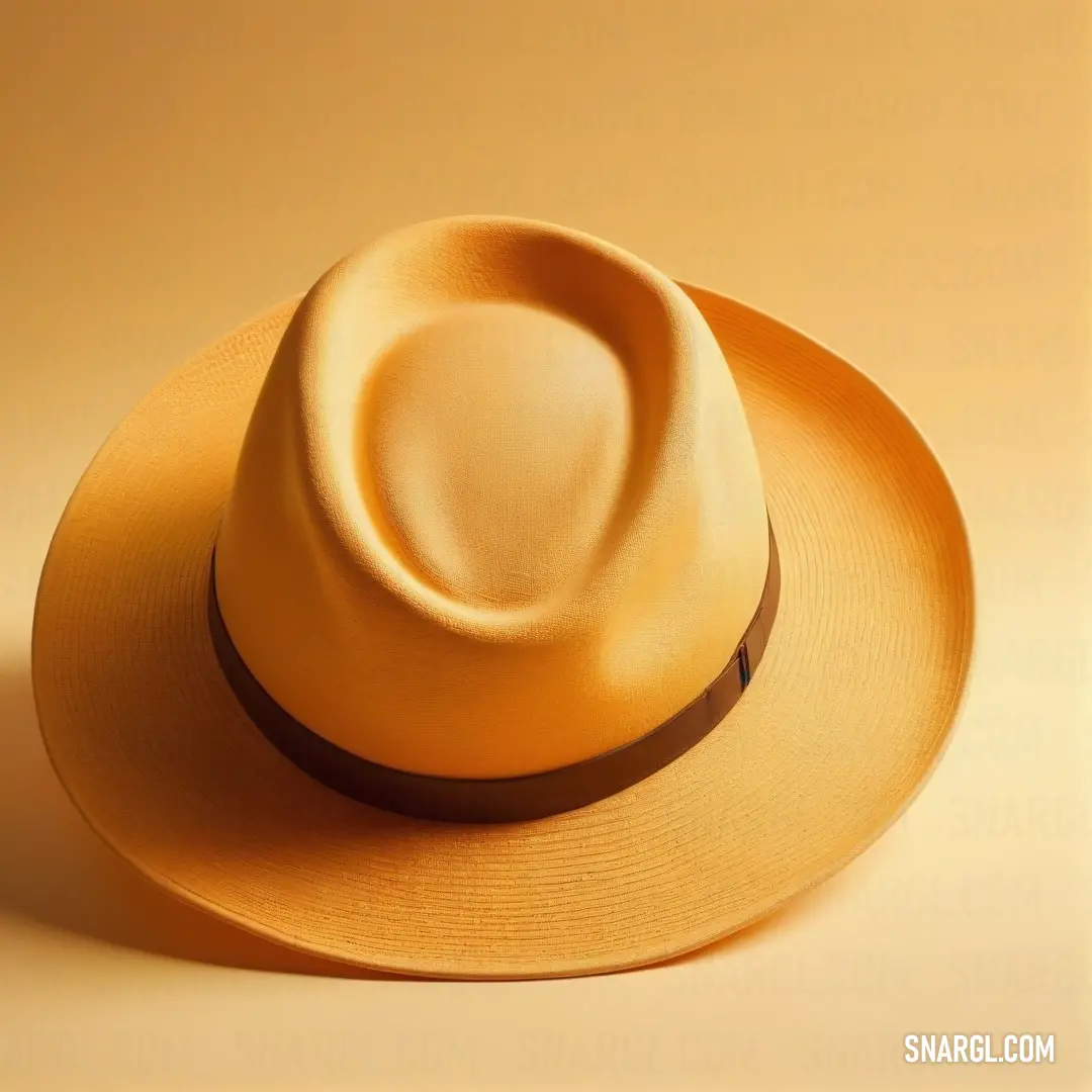 Yellow hat is on a yellow surface with a brown band around the brimmed hat's brim. Example of RGB 255,167,0 color.