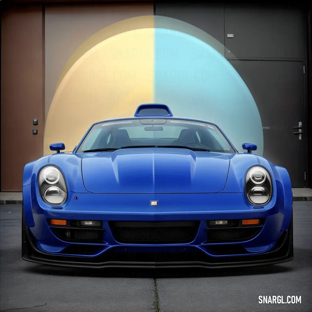 Blue sports car parked in front of a building with a circular window behind it and a circular door. Example of CMYK 100,58,0,33 color.