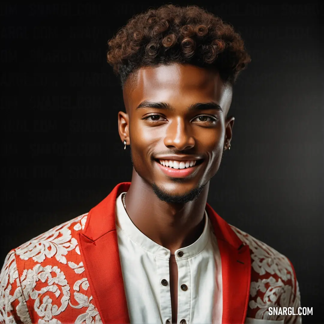 Man with a red jacket and white shirt smiling at the camera with a black background. Color RGB 255,64,64.