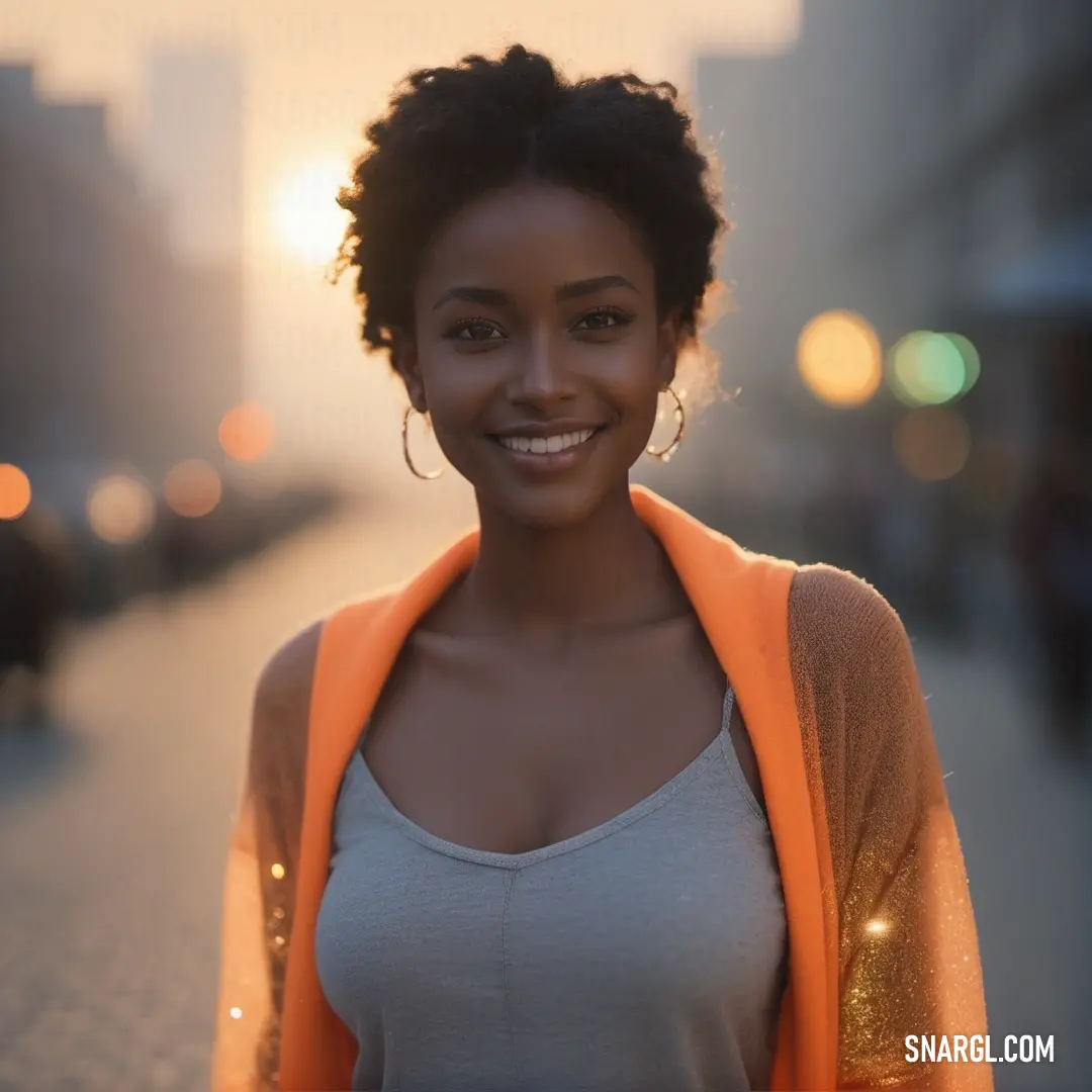 Woman standing on a street with a bright light in the background. Color #FF7F50.