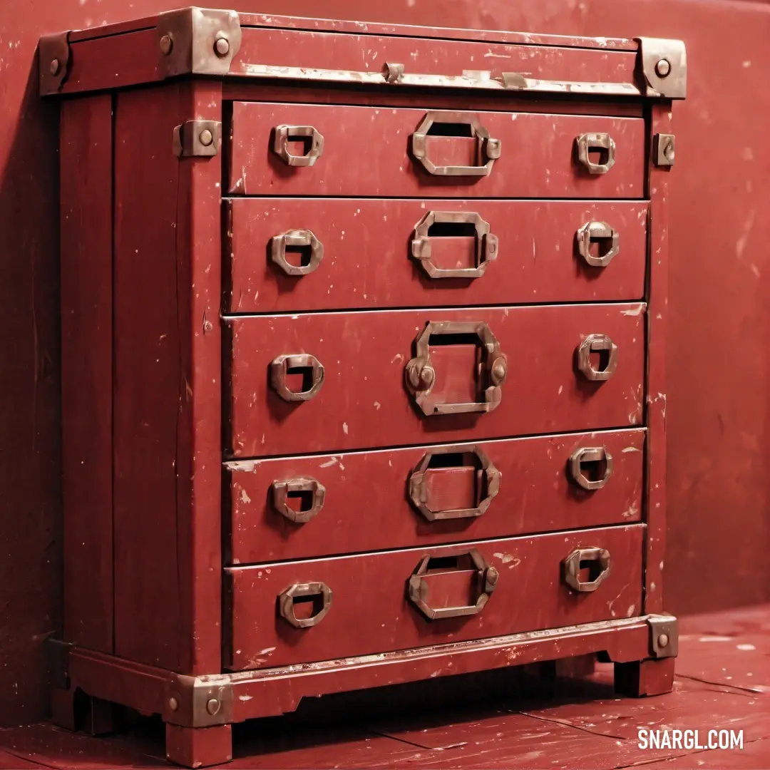 Red chest of drawers with metal handles and knobs on a red wall with a red floor. Example of #B31B1B color.