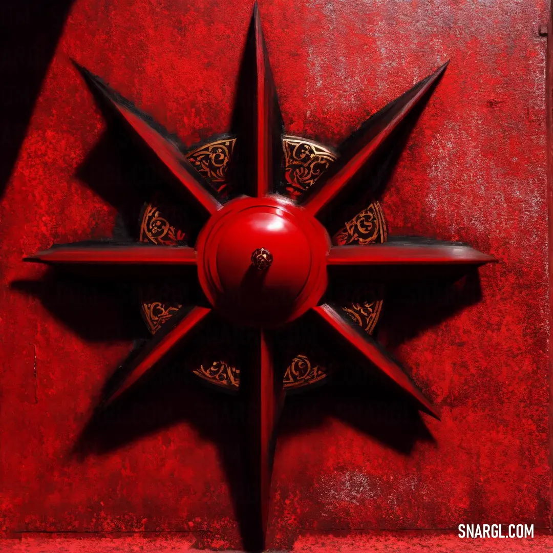 Red star with a black and gold decoration on it's side and a red background with a black