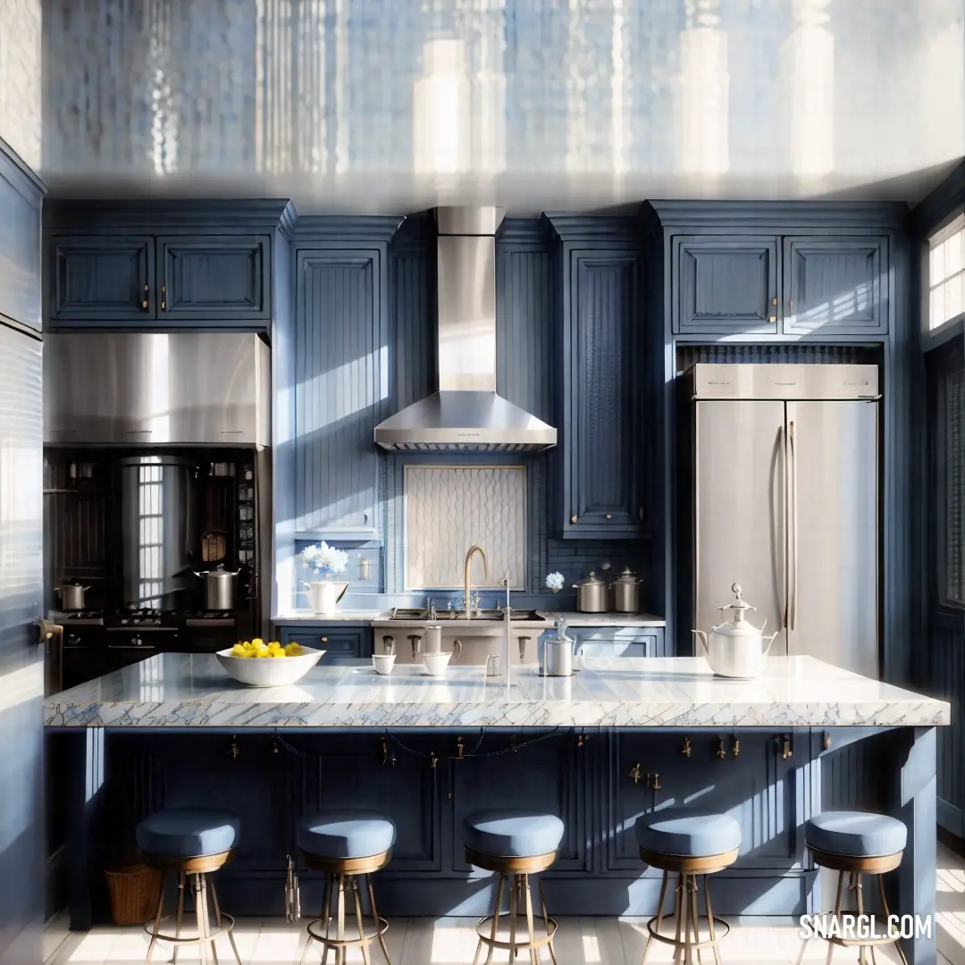 Kitchen with a marble counter top and blue cabinets and stools and a stainless steel refrigerator and stove