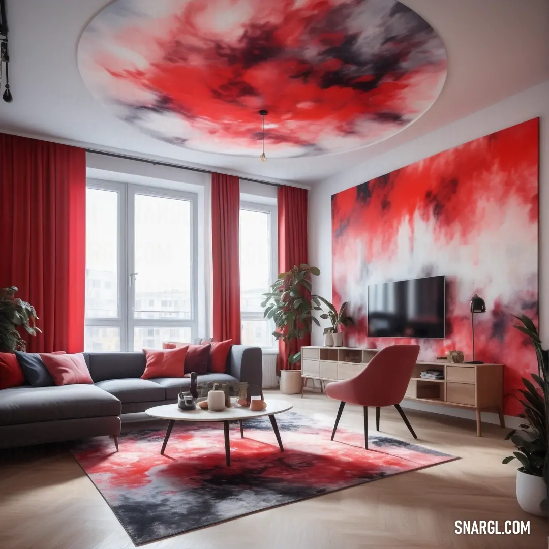 Crimson color. Living room with a large painting on the wall and a red couch and chair in the middle of the room