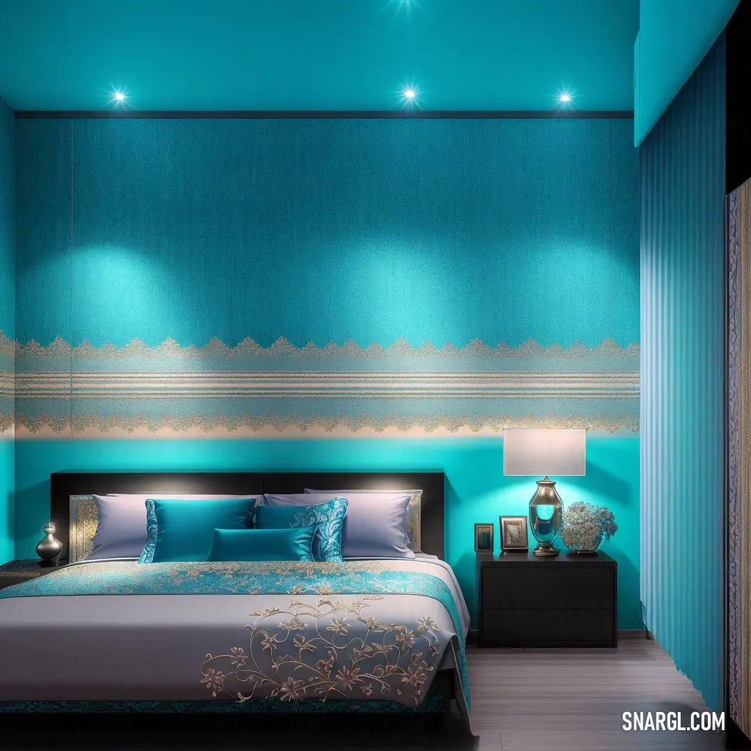 Bedroom with a blue wall and a bed with a blue comforter and pillows on it and a night stand with a lamp