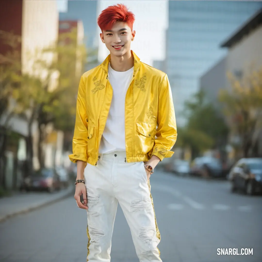 Man with red hair wearing a yellow jacket and white pants standing on a sidewalk in front of a city street. Example of CMYK 0,6,80,6 color.