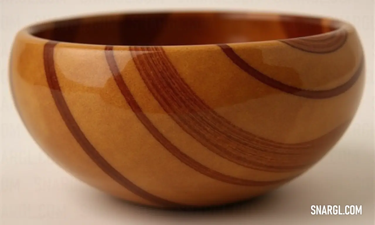 A beautifully designed brown bowl with a subtle stripe rests gracefully against a minimalist white backdrop. This combination of colors emphasizes the bowl's craftsmanship, creating a stunning visual that serves as both a functional piece and a work of ar