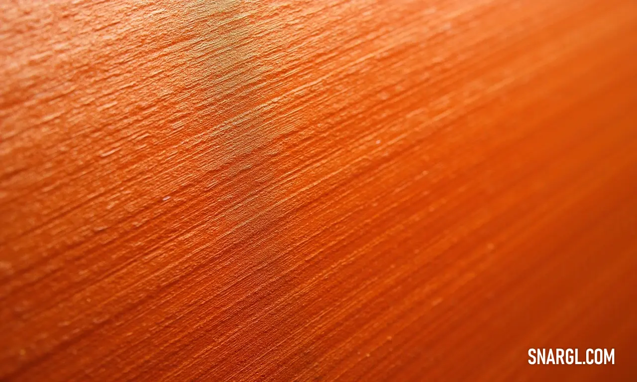 An exquisite close-up of a wood-grained surface showcases its rich dark brown color and intricate patterns, accentuated by a subtle white line that adds a touch of elegance and intrigue.