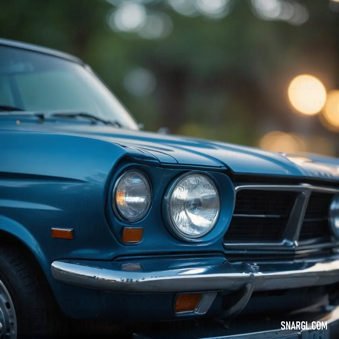 A striking blue Mustang parked in a sunlit lot, with headlights glowing and hood raised, embodying a bold and adventurous spirit reminiscent of dark cyan hues.