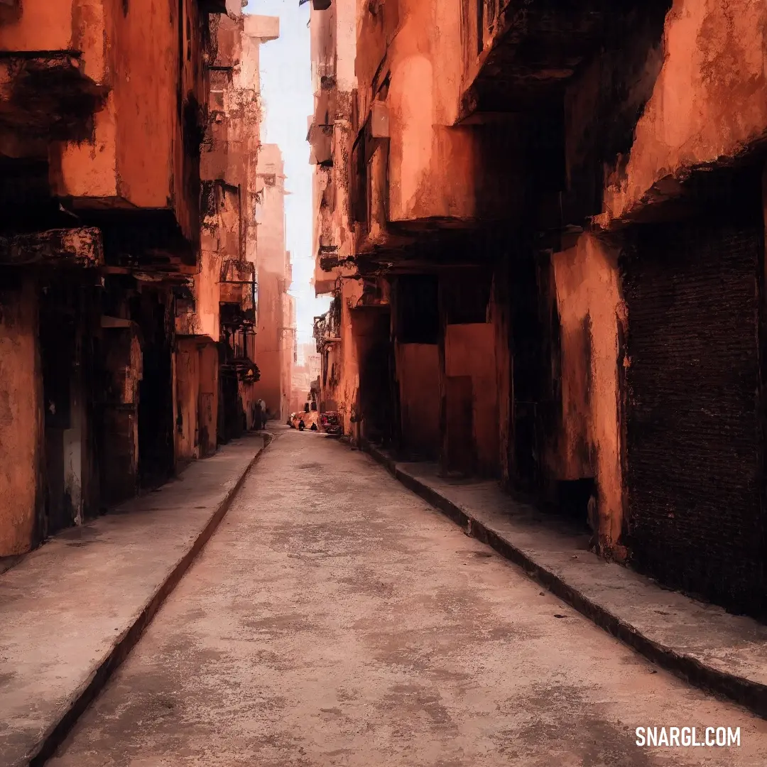 Narrow street with a few buildings on both sides of it. Color CMYK 0,70,82,24.