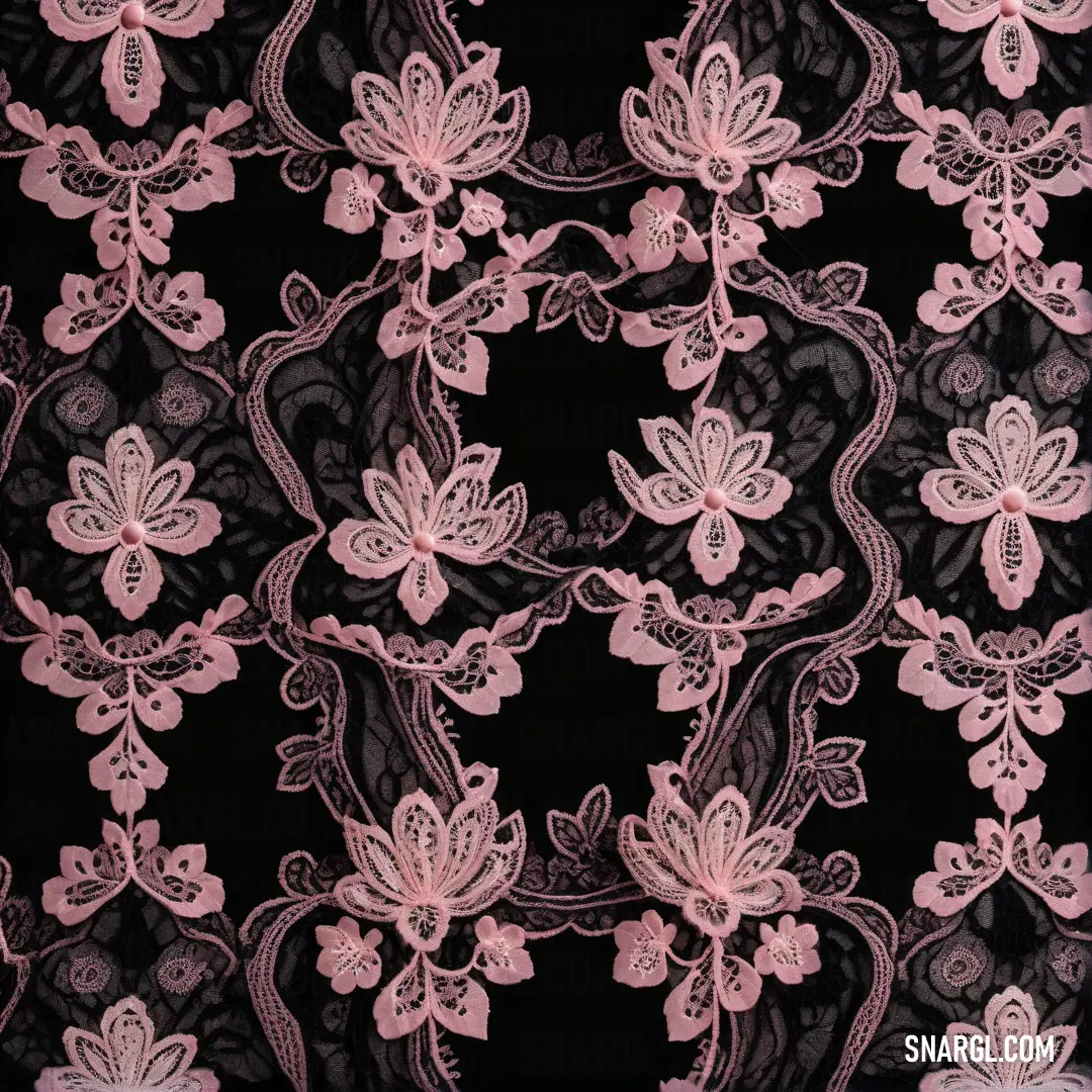 Black and pink lace fabric with flowers on it's side and a flower on the side of the fabric. Example of #DB9785 color.