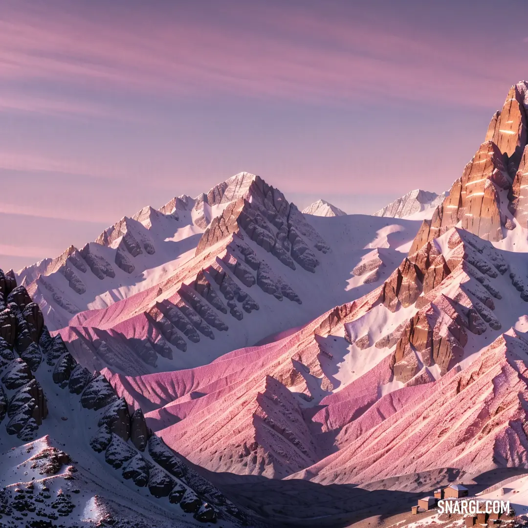 Mountain range with a pink sky and clouds in the background and a few snow covered mountains in the foreground