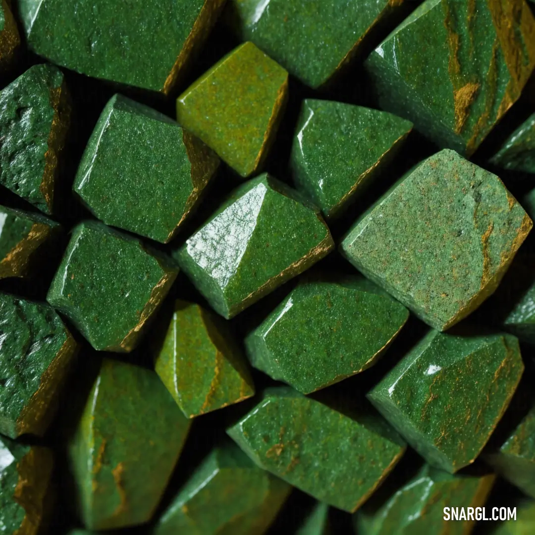 Close up of a green and brown mosaic tile wallpaper pattern with a green and brown color scheme