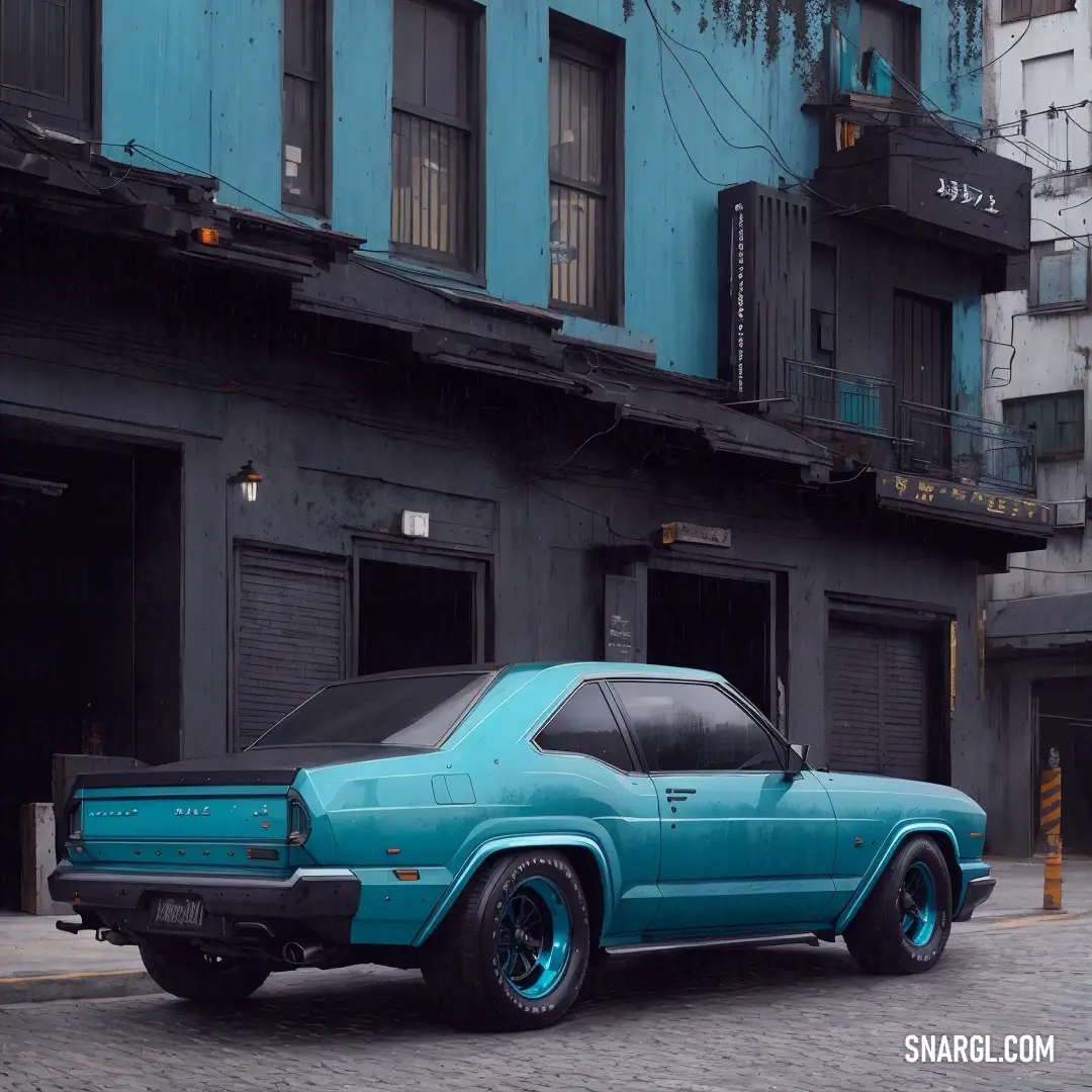 Blue car parked on the side of a road next to a building with a blue door and windows