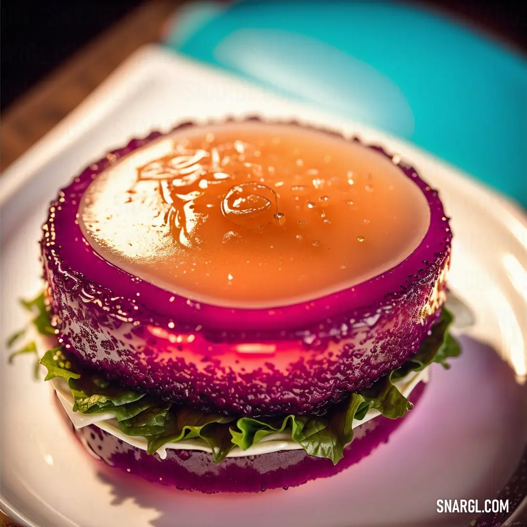 Sandwich with a purple substance on it on a plate with a blue background and a blue