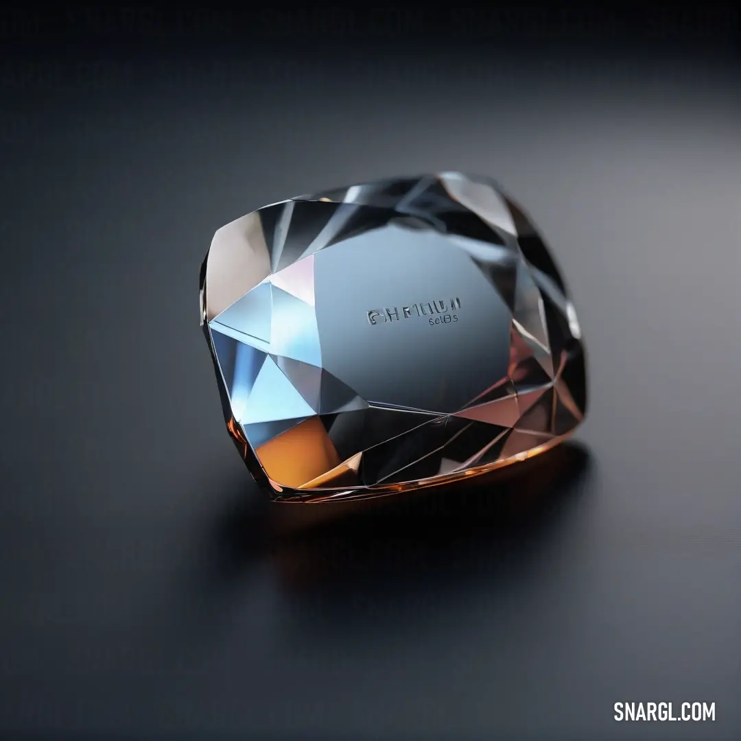 A diamond-shaped object sits atop a table, its deep carrot orange hue illuminated by a soft, focused light. The sharp angles of the object are mirrored by the black surface beneath it, creating a dramatic play of light and shadow.