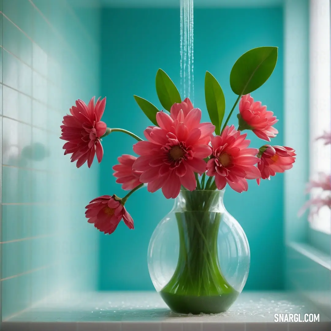 Vase with pink flowers in it on a window sill with a blue wall behind it and a green planter. Color Deep chestnut.