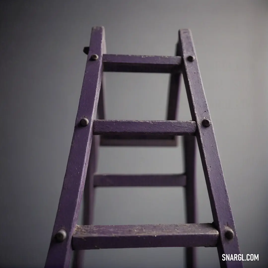 A vibrant purple ladder rests against a smooth gray wall, creating a striking contrast. The ladder seems to invite exploration, while the muted background enhances its bold color and shapes.