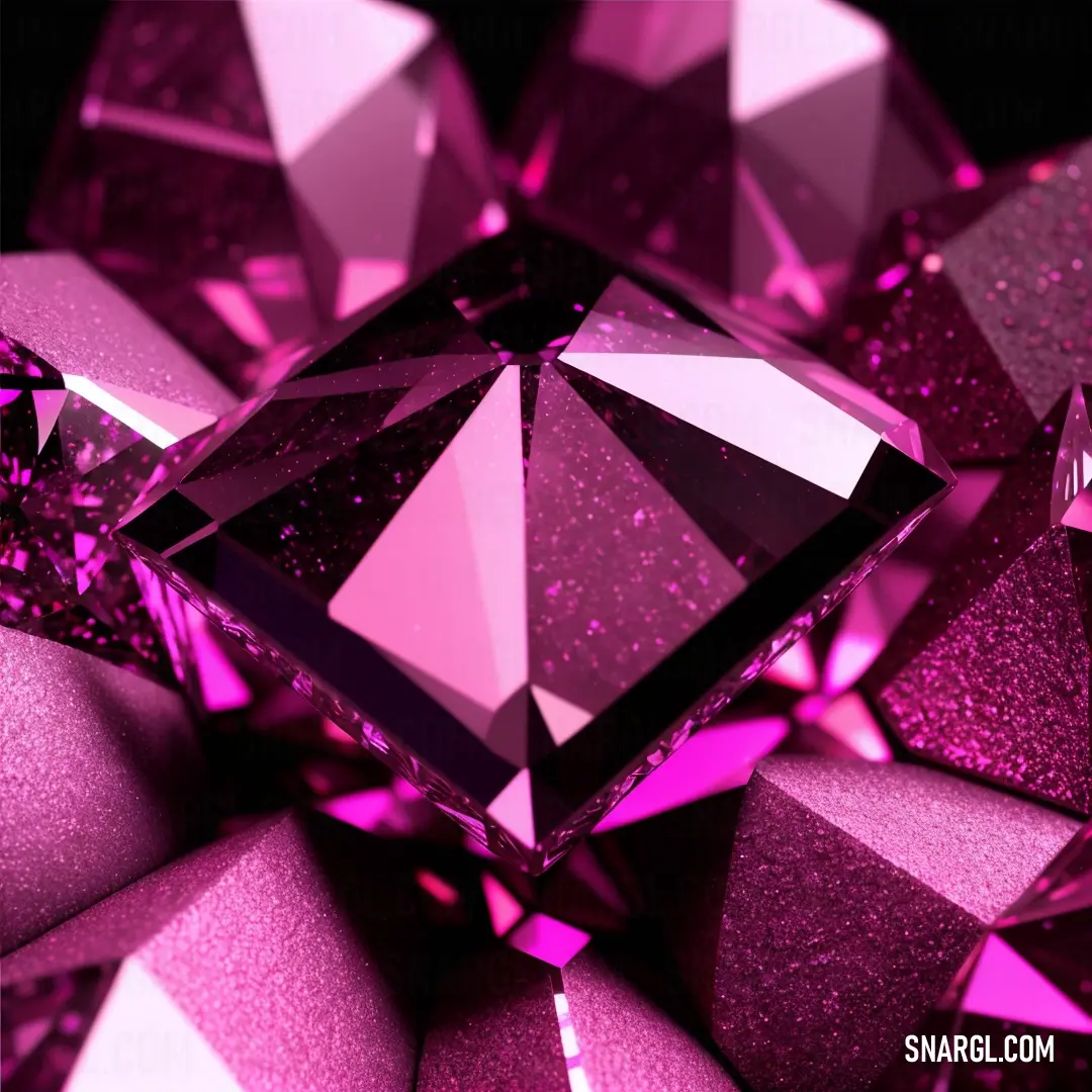 Close up of a pink diamond with glitter on it's surface and a black background with a white border