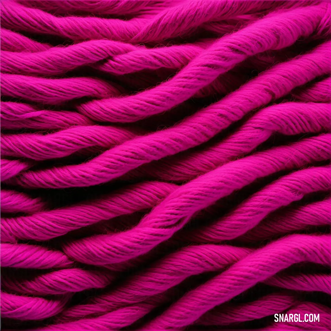 Pink yarn ball is shown in this image